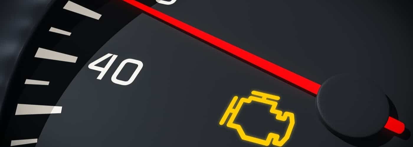 Speedometer close-up showing 40 mph and illuminated check engine light indicator.